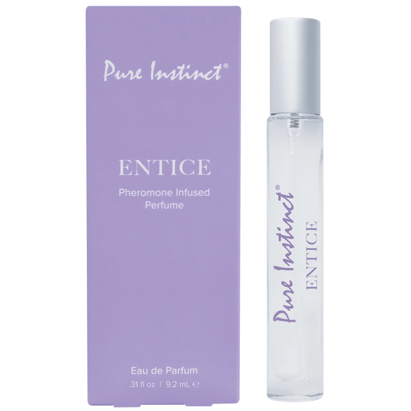 Pure Instinct Entice pheromone perfume roller in clear glass bottle beside lavender box