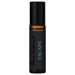 Close-up of Pure Instinct Escape amber roll-on bottle with black cap, no box