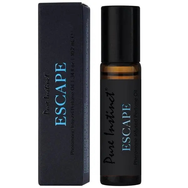 Pure Instinct Escape pheromone roll-on perfume oil beside its dark navy gift box
