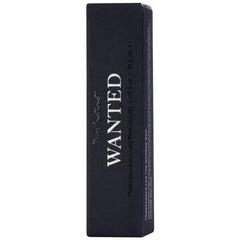Close-up of Pure Instinct Wanted black rectangular box showing product name and 10.2 mL size
