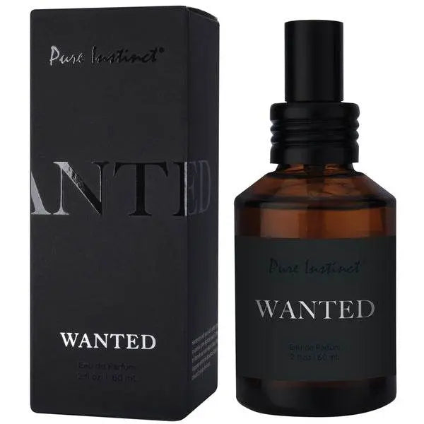 Pure Instinct Wanted Eau de Parfum amber spray bottle beside sleek black box