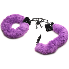Purple faux fur handcuffs laid flat showing black cuffs, chain, two keys and quick-release tab