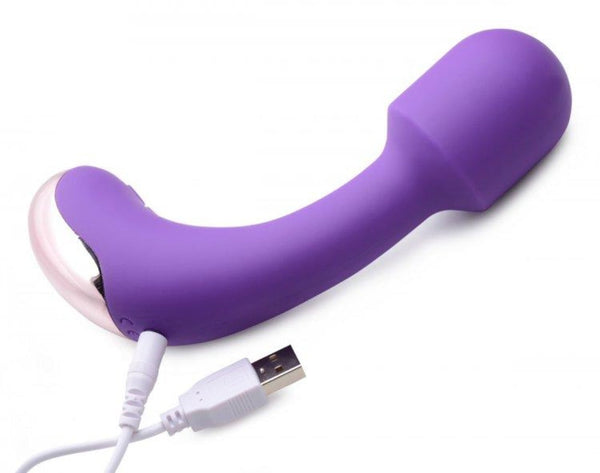 Purple G-Spot Wand lying flat with USB charging cable attached to base
