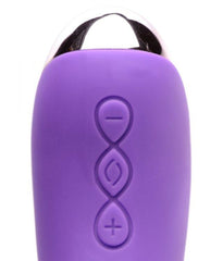 Close-up of purple silicone control panel with plus, minus, and mode buttons