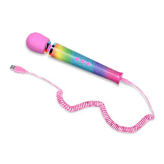 Rainbow ombre wand massager with coiled pink USB charging cable attached