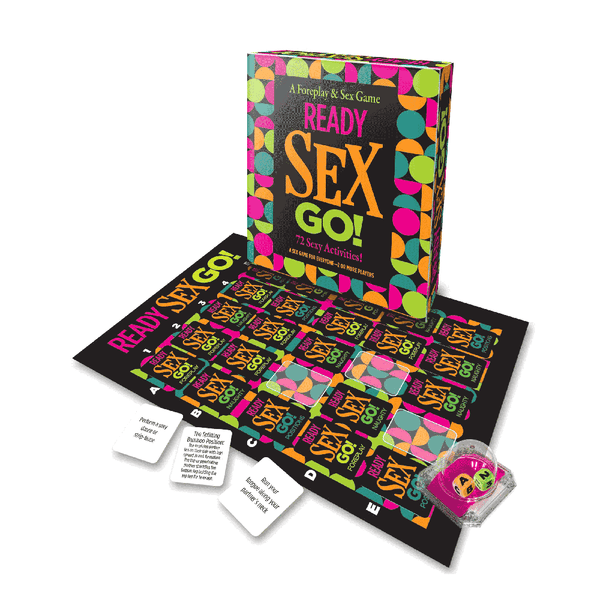 Ready Sex Go game set laid out with folded board, activity cards, and pink spinner piece