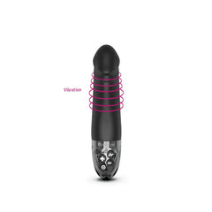 Real Deal Neal black vibrator with pink rings illustrating vibration zone along shaft