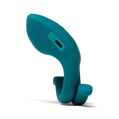 Rear angle of Dame Hug cock ring revealing USB-C charging port on smooth teal body
