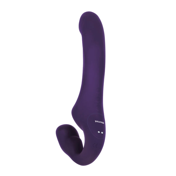 Rear angle of rechargeable purple strapless strap-on displaying charging ports and brand logo