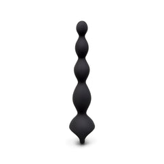 Rear view of b-Vibe black silicone vibing beads showing graduated bead sizing and charging port tip