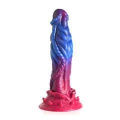 Rear three-quarter view of Intruder alien dildo showing ribbed spine detail and textured base