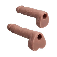 Rear view of two realistic silicone attachments showing hollow mounting port opening
