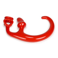 Close-up of red Alien Tail showing tapered plug tip and dual cockring base
