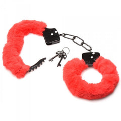 Red fur Cuffed in Fur handcuffs laid flat with two black metal keys included
