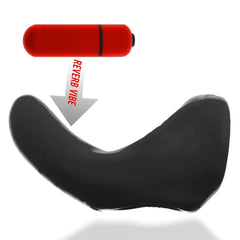 Red reverb bullet vibe shown inserting into the BUZZFUCK black silicone sling