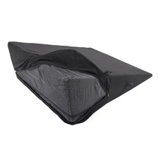 Removable black cover partially unzipped revealing inner foam wedge insert beneath