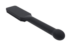 Reverse angle of black silicone paddle highlighting smooth back face and ball-end handle