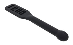 Reverse angle of black silicone paddle highlighting smooth flat striking side and rounded handle