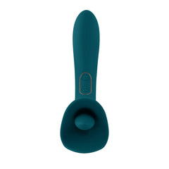 Reverse side of teal vibrator showing tongue nub detail inside the stimulator cup attachment
