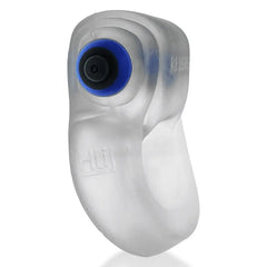 Close-up of REVRING push-button control on blue bullet vibe nestled in clear silicone holder