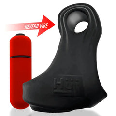 REVSLING cock and ball sling next to red reverb vibe, arrow indicating vibe placement