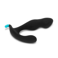 Rocker Plug laid flat showing ergonomic rocking base and smooth matte silicone finish