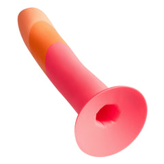 ROMP Dizi dildo angled view highlighting wide suction cup base with mounting hole