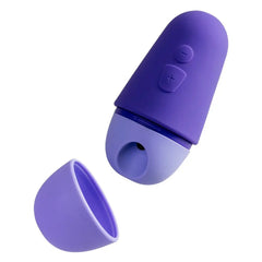 ROMP Free X purple silicone stimulator with detached cap showing air-pulse opening and controls