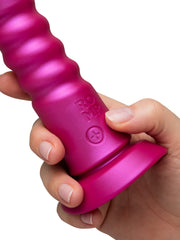 Close-up of ROMP Jiggle base showing embossed brand logo and plus control button
