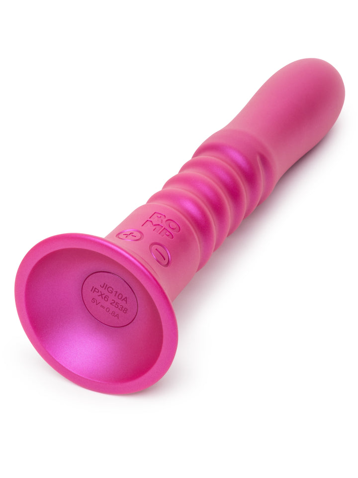 ROMP Jiggle pink silicone kegel exerciser with suction base, angled hero view