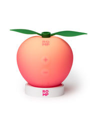 ROMP Pink Peach on charging base showing ROMP logo and plus and minus control buttons