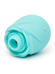 ROMP Rose Glow teal stimulator laid on its side revealing the circular Pleasure Air opening