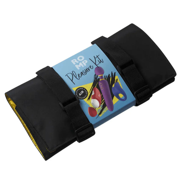 ROMP Pleasure Kit rolled and secured with black velcro straps, compact travel-ready storage