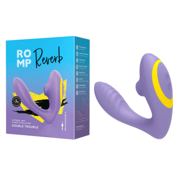 ROMP Reverb dual stimulator in lavender silicone beside its gradient blue and purple retail box