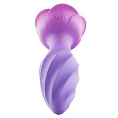 Close-up of rose plug power button embossed on pink flower-shaped base, purple spiral shaft visible
