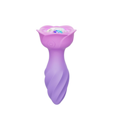 Rotating Rose Plug reverse angle revealing rose-shaped pink base with iridescent crystal centre