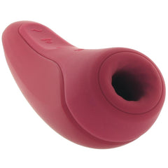 Close-up of the Satisfyer Curvy 1+ nozzle opening and smooth matte silicone surface in rose red