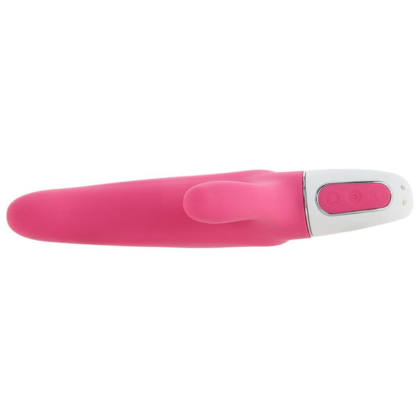 Satisfyer Mr. Rabbit pink vibrator shown horizontally, revealing control buttons and slim profile