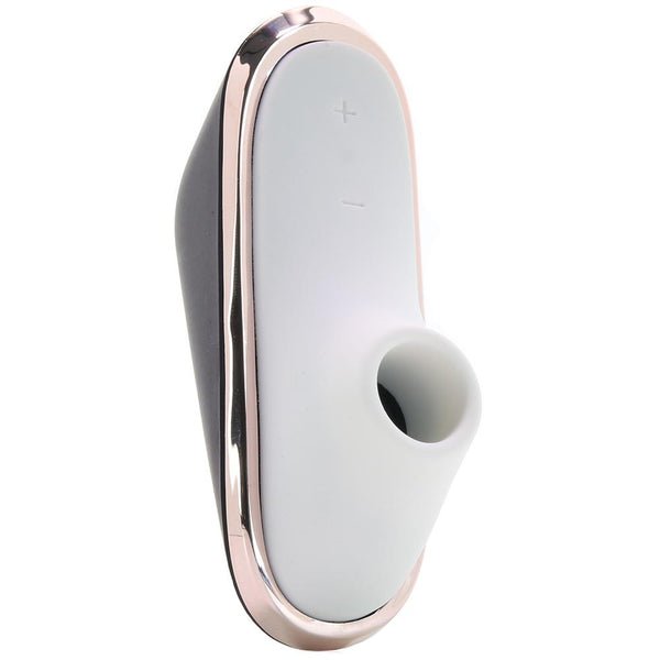 Satisfyer Pro Traveler air-pulse stimulator, front view, white body with rose-gold trim and oval opening