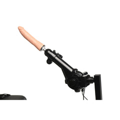 Close-up of sex machine arm at angled position with silicone dildo attached to thrusting mechanism