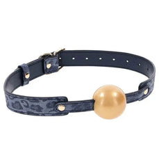 Sex & Mischief Cougar Ball Gag with navy leopard-print strap and gold-tone ball, front view