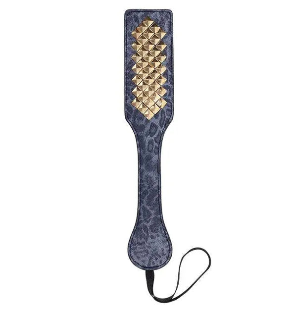 Sex & Mischief Cougar Studded Paddle with gold pyramid studs on blue leopard-print faux leather