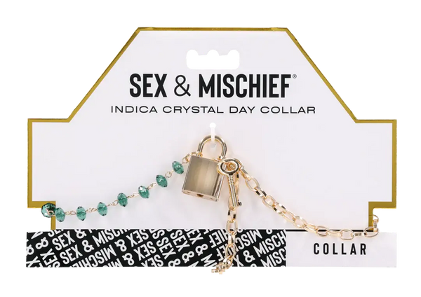 Sex & Mischief Indica Crystal Day Collar on retail card with gold padlock and key charms