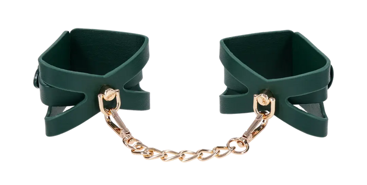 Sex & Mischief Indica Cutout Cuffs in forest green vegan leather with gold chain