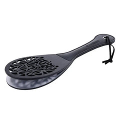 Sex & Mischief Lace Spanker in black with decorative cut-out paddle head and leather handle