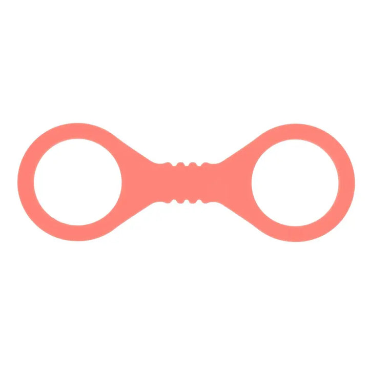 Sex & Mischief silicone wrist cuffs in coral pink, figure-eight shape on white background