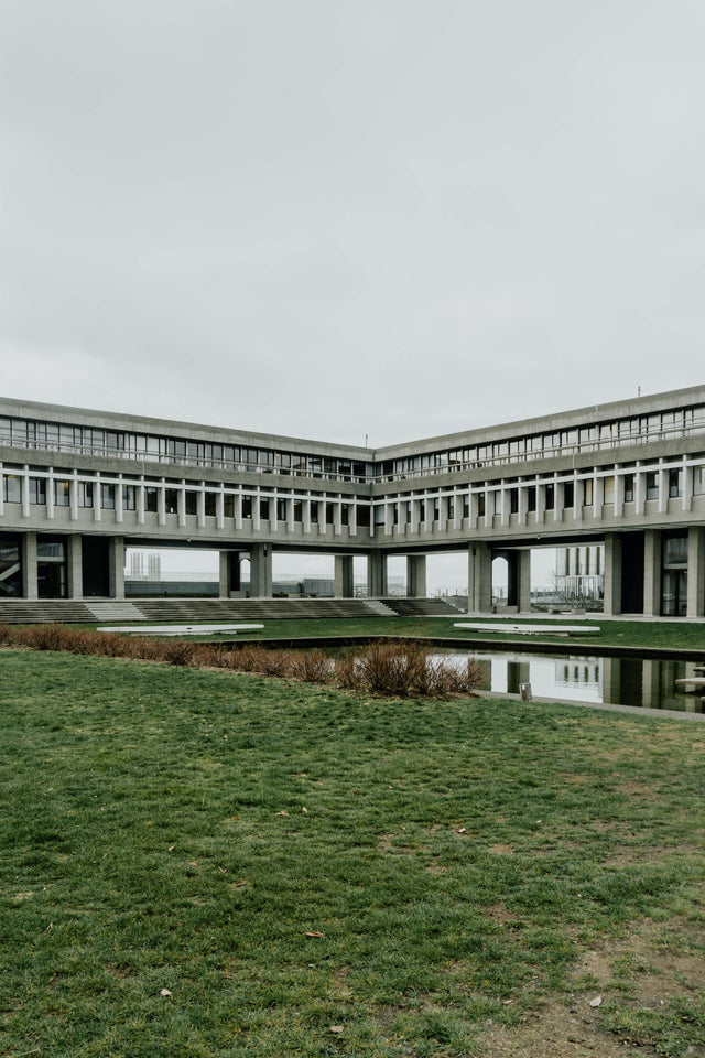 Pond beside the concrete architecture of Simon Fraser University in Burnaby