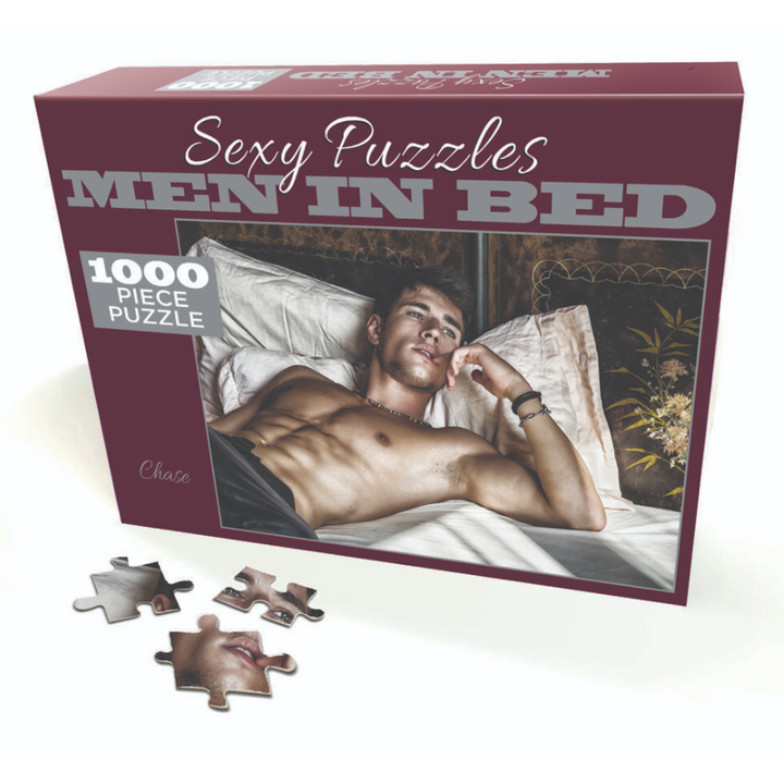 Sexy Puzzles Men In Bed Chase 1000-piece puzzle box with deep burgundy packaging and loose pieces