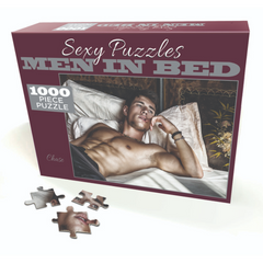 Sexy Puzzles Men In Bed Chase 1000-piece puzzle box with deep burgundy packaging and loose pieces
