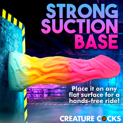 Shape Shifter alien dildo mounted via strong suction base on vertical flat surface for hands-free use